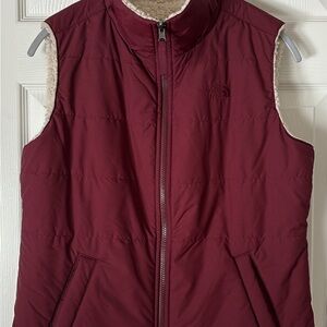 The North Face Women’s Burgundy Puffer Vest with Sherpa Lining
